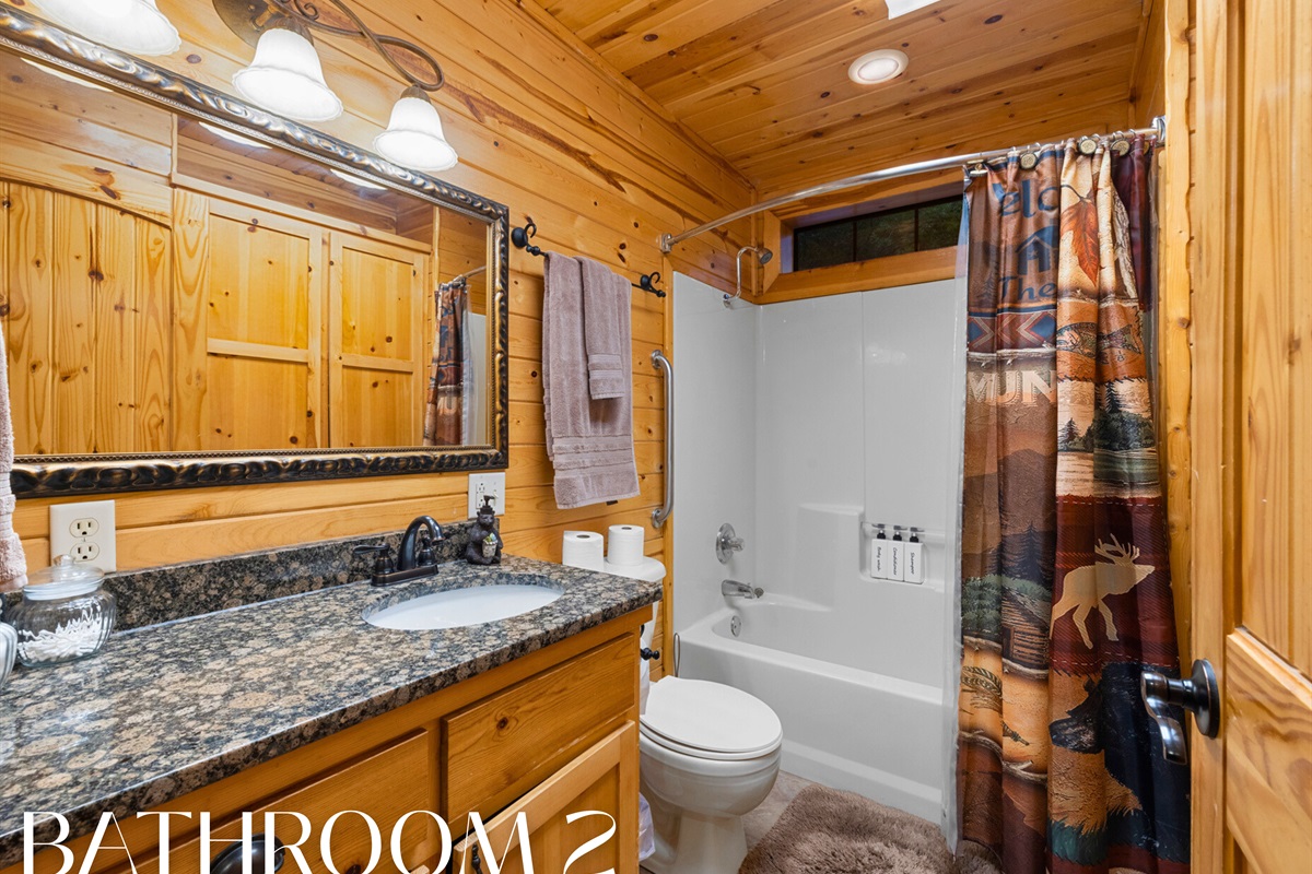 Bathroom 2 with granite vanity and full tub/shower