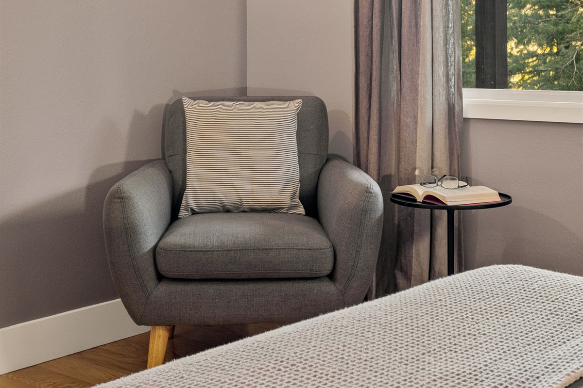 Bedroom 1: Settle in with a good book before you drift off to sleep in this quiet natural setting.
