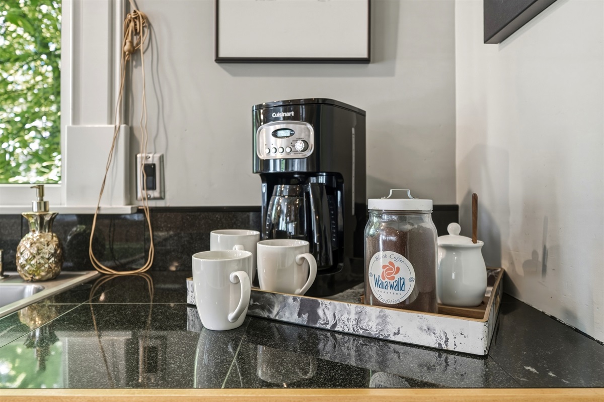 12-cup drip coffee maker and initial supply of ground coffee provided