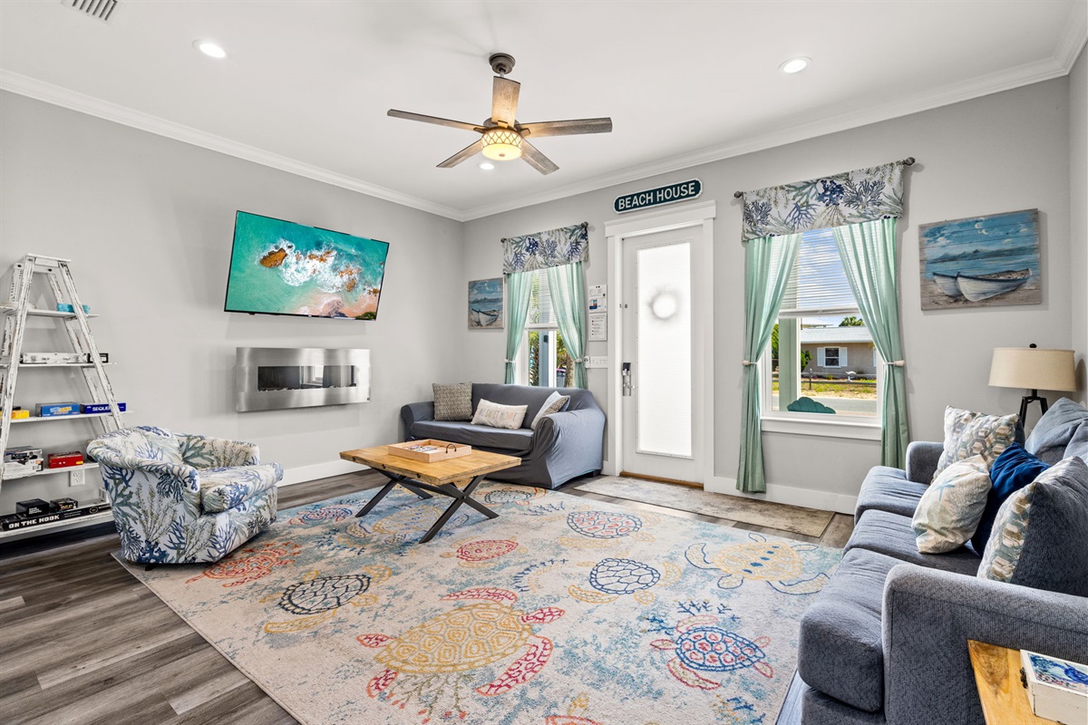 living room with smart tv and electric fireplace