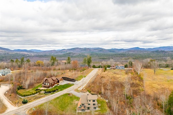 See the full property and surroundings from above.