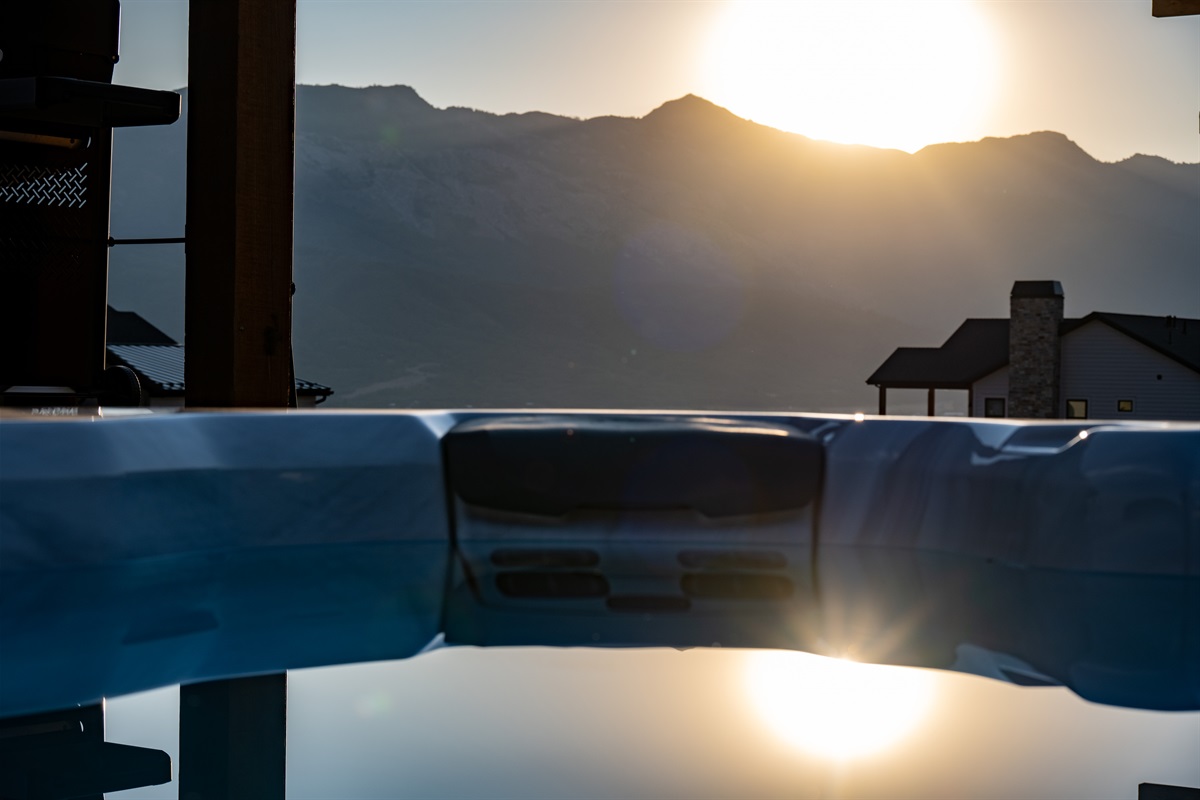 Let the hot tub melt your stress away as you gaze at the serene Wasatch peaks.