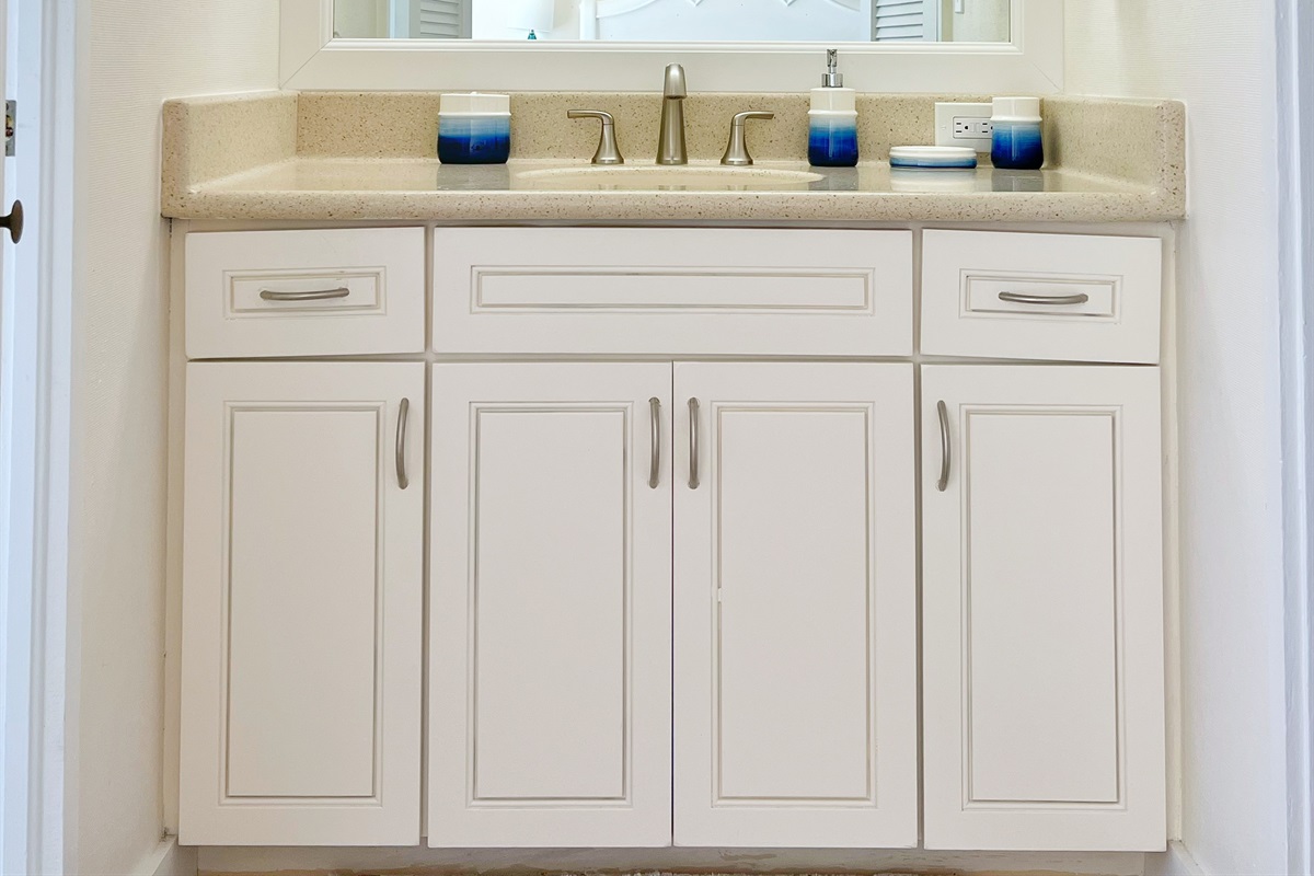 Bright lighting and modern fixtures make this bathroom perfect for daily routines.