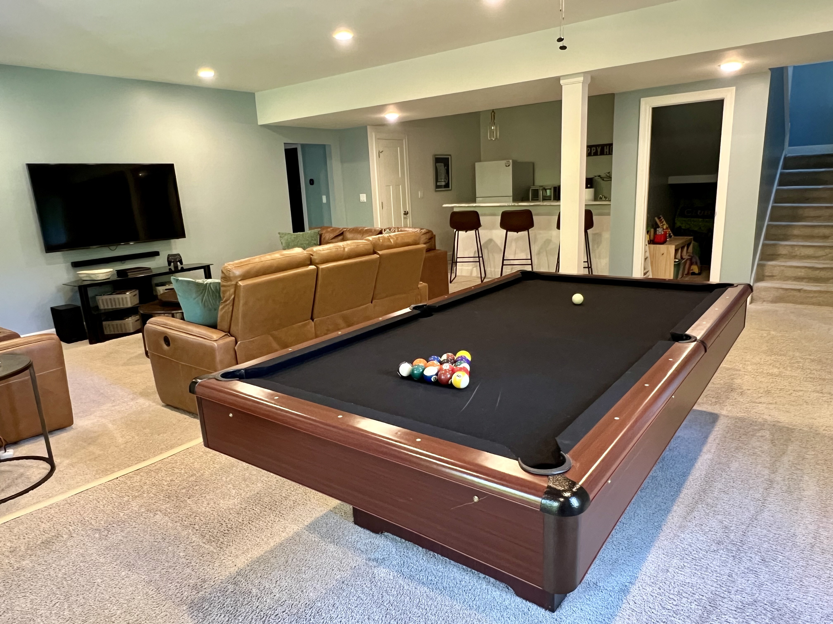 Challenge friends to a game of pool.