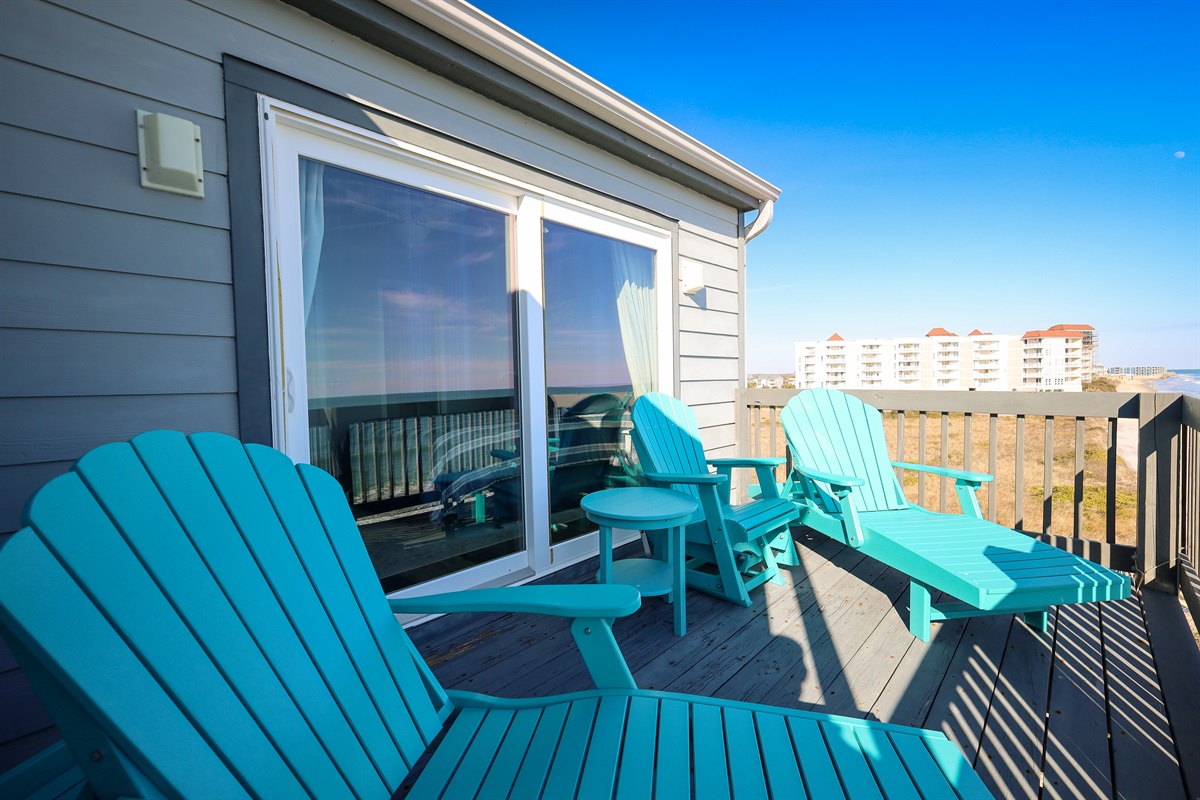 Top floor balcony with loungers and ocean breezes