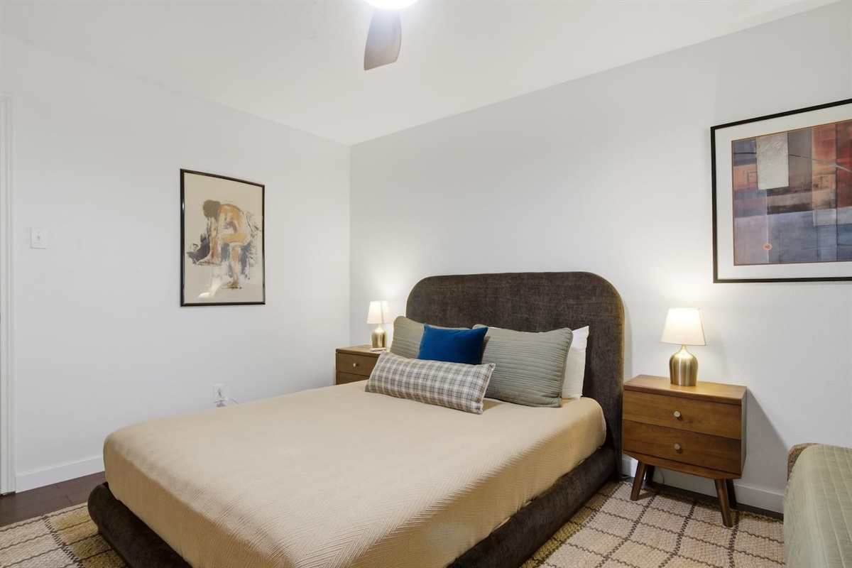 Twin and Queen bedroom with room darkening shades and comfy beds.
