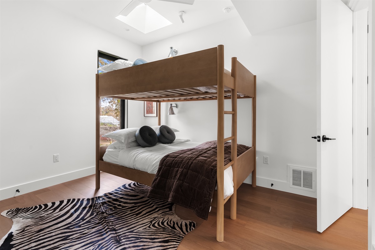 Fun and functional bunk room—perfect for kids, teens, or friends traveling together.
