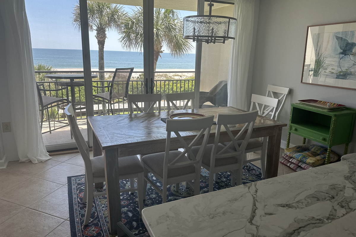 New view from newly remodeled kitchen and dinning area-New table for the space.