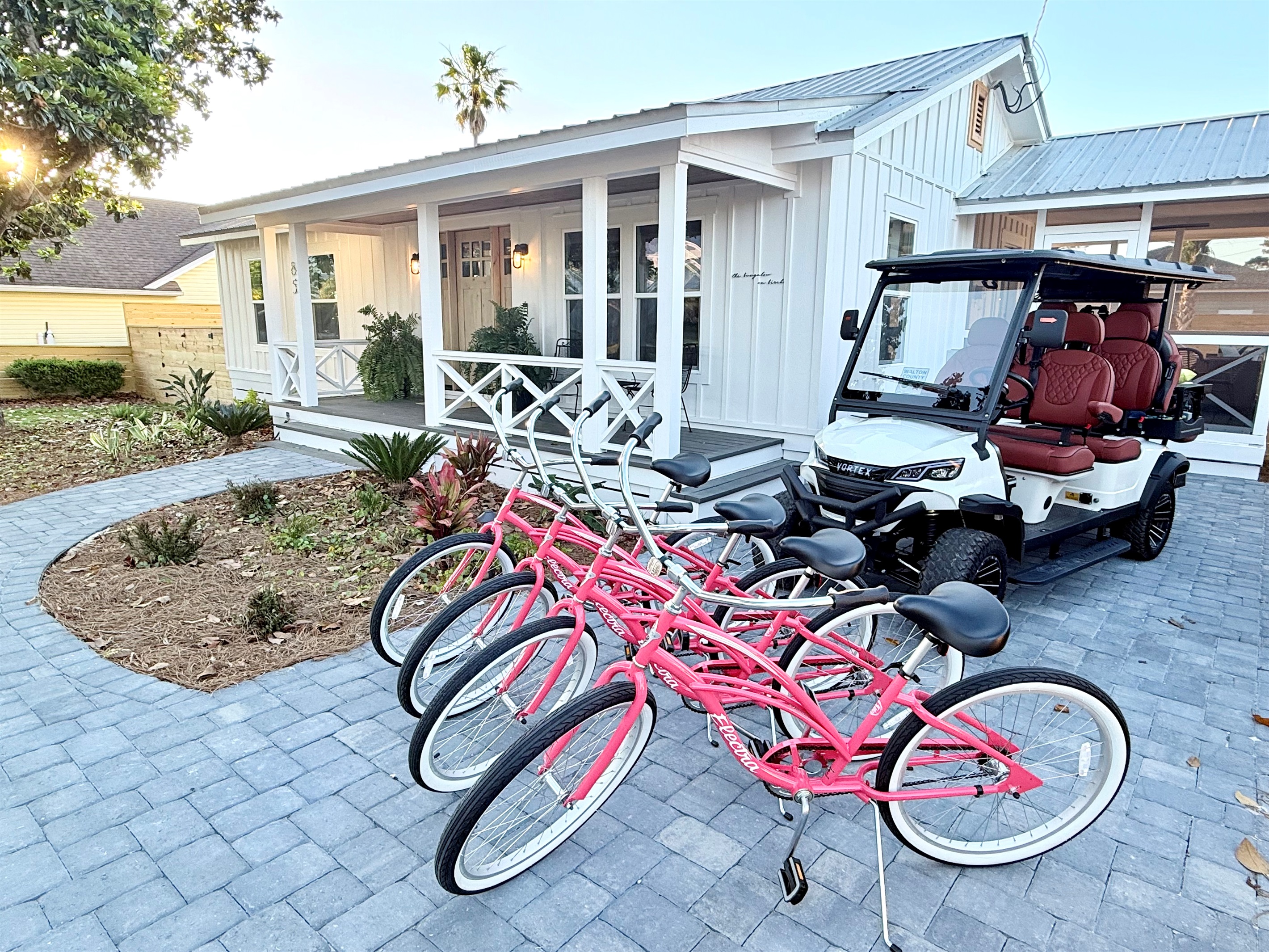 6 seater golf cart and 4 beach cruisers