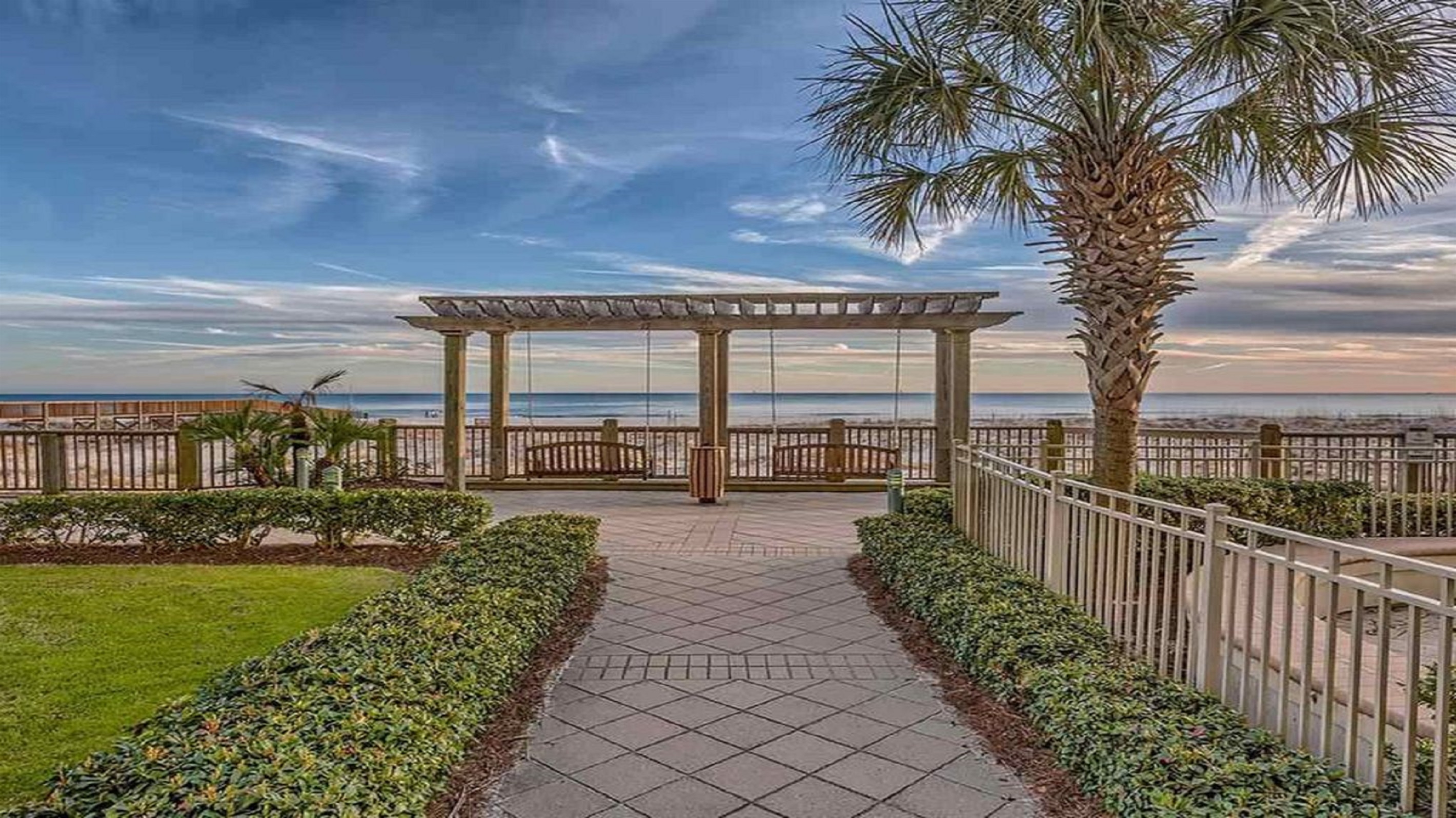 Elegantly designed for leisure. This shaded swing area offers the perfect blend of comfort and scenic beauty.