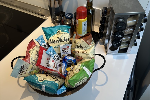 A little something to make you feel right at home—snacks and spices, all set for your stay.