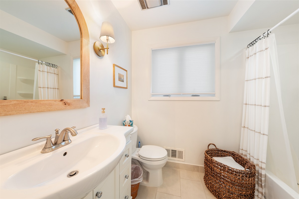 The entry-level bathroom offers a full-size tub and shower and is close to all bedrooms.