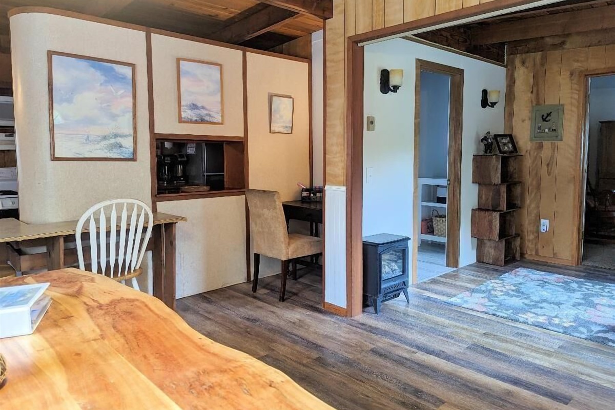 desk tucked into dining room