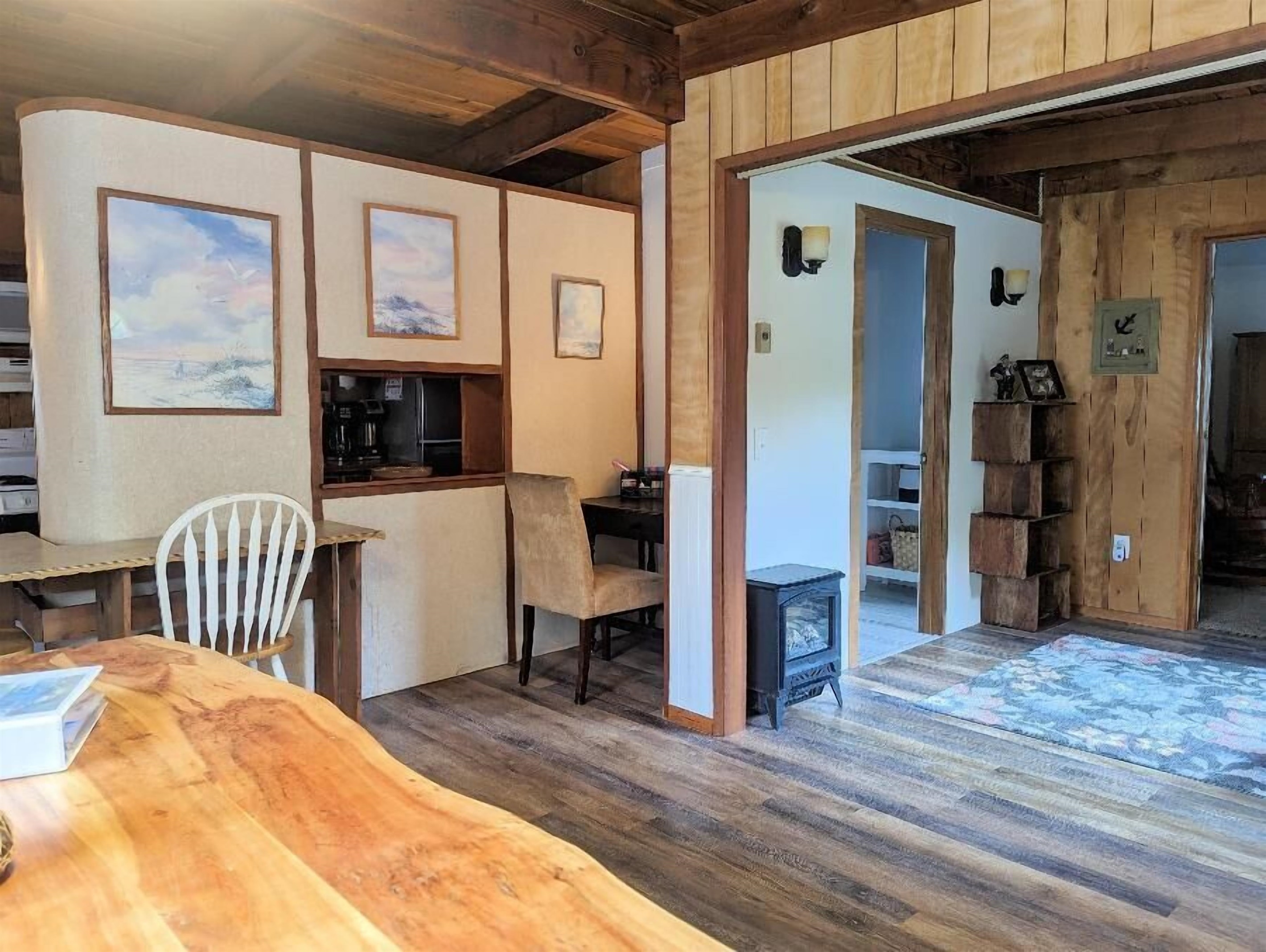 desk tucked into dining room