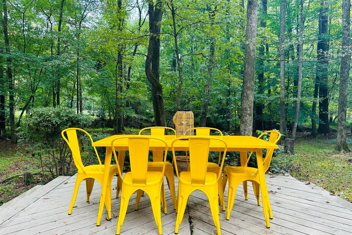 Enjoy al fresco dining with seating for 6 in the backyard overlooking the creek.