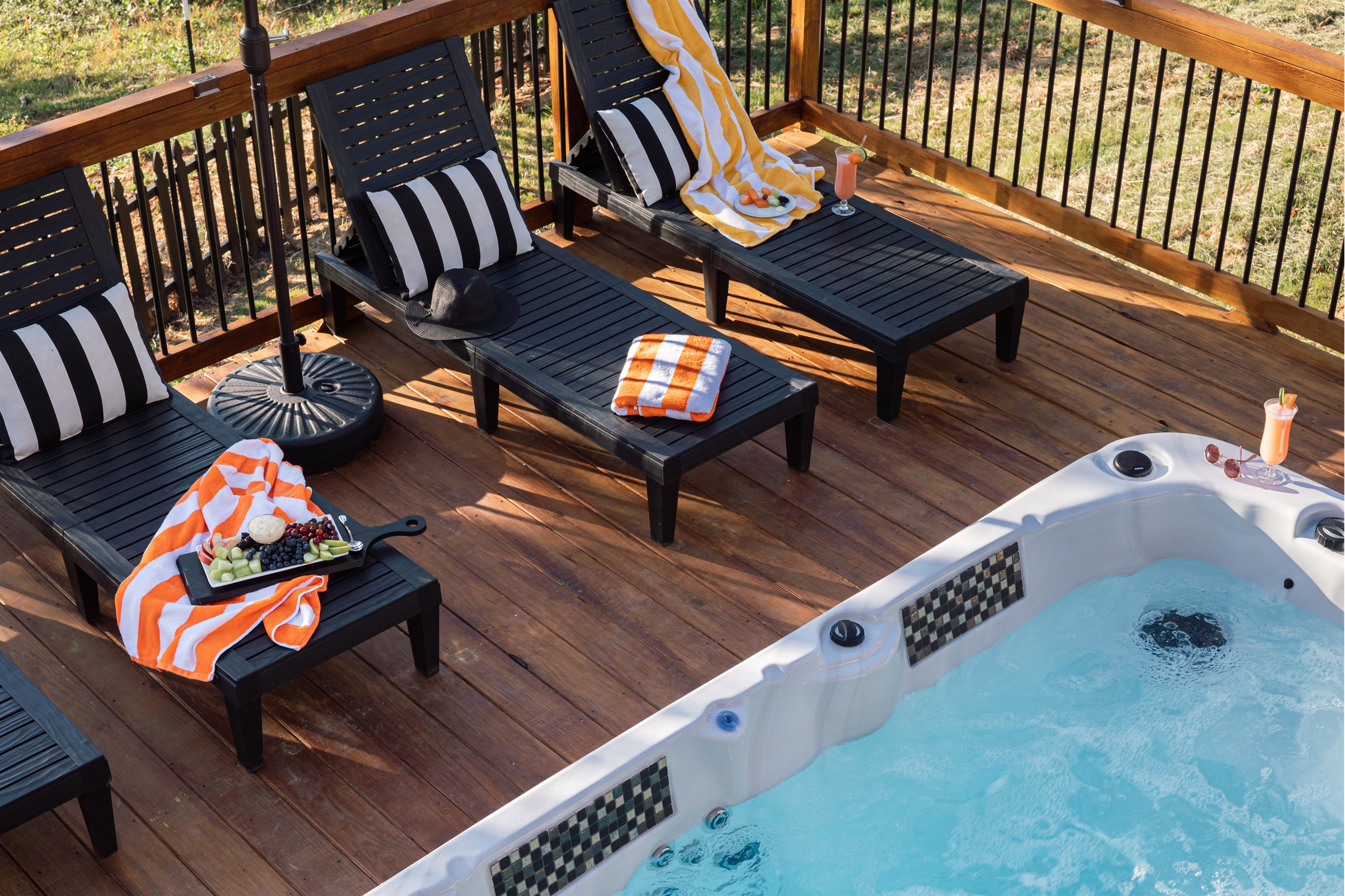 {Swim Spa Lounge Deck}
Spend sunny afternoons lounging poolside, cooling off in the swim spa, and taking in the mountain air. Designed for slow mornings, wellness resets, and easy outdoor living.