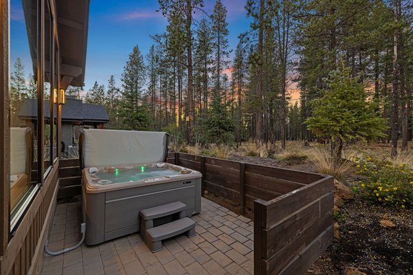 Private hot tub tucked into the pines, perfect for winding down after a day of adventure