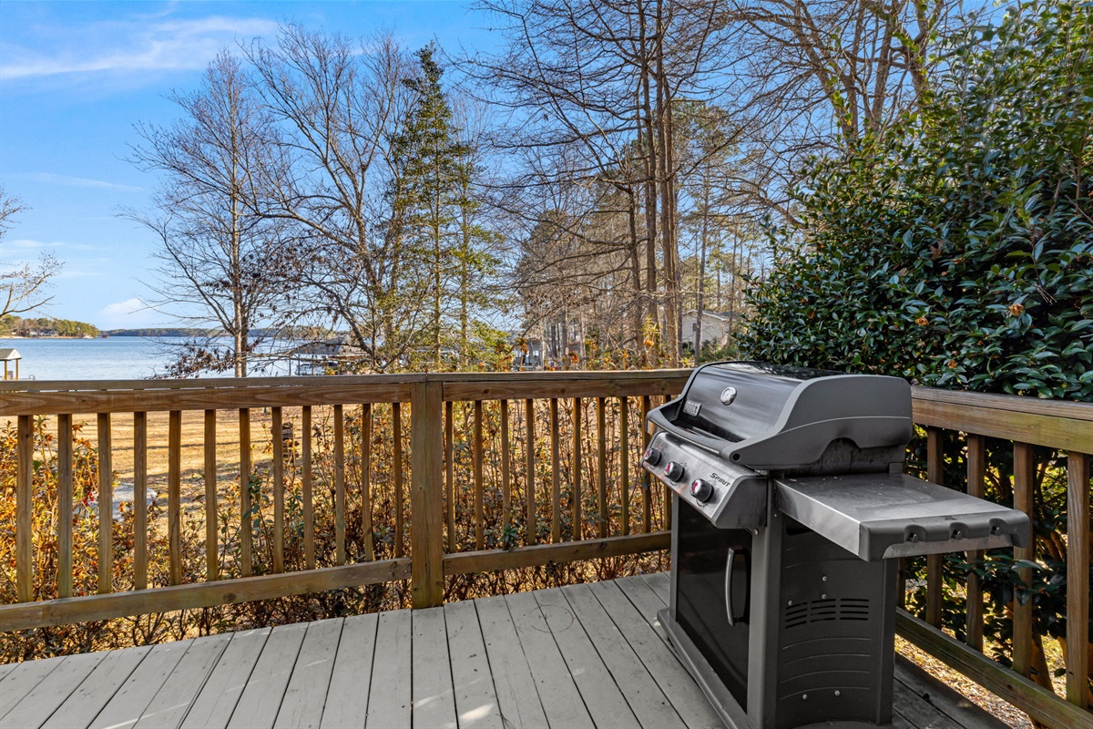 Outdoor Patio: Sizzle and soak in lakeside views from the grill-ready deck! Perfect for gatherings!