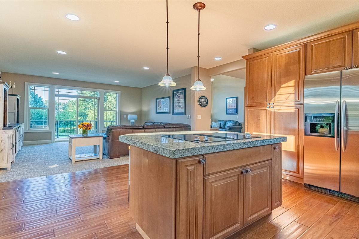 Kitchen island with ceramic cook top.