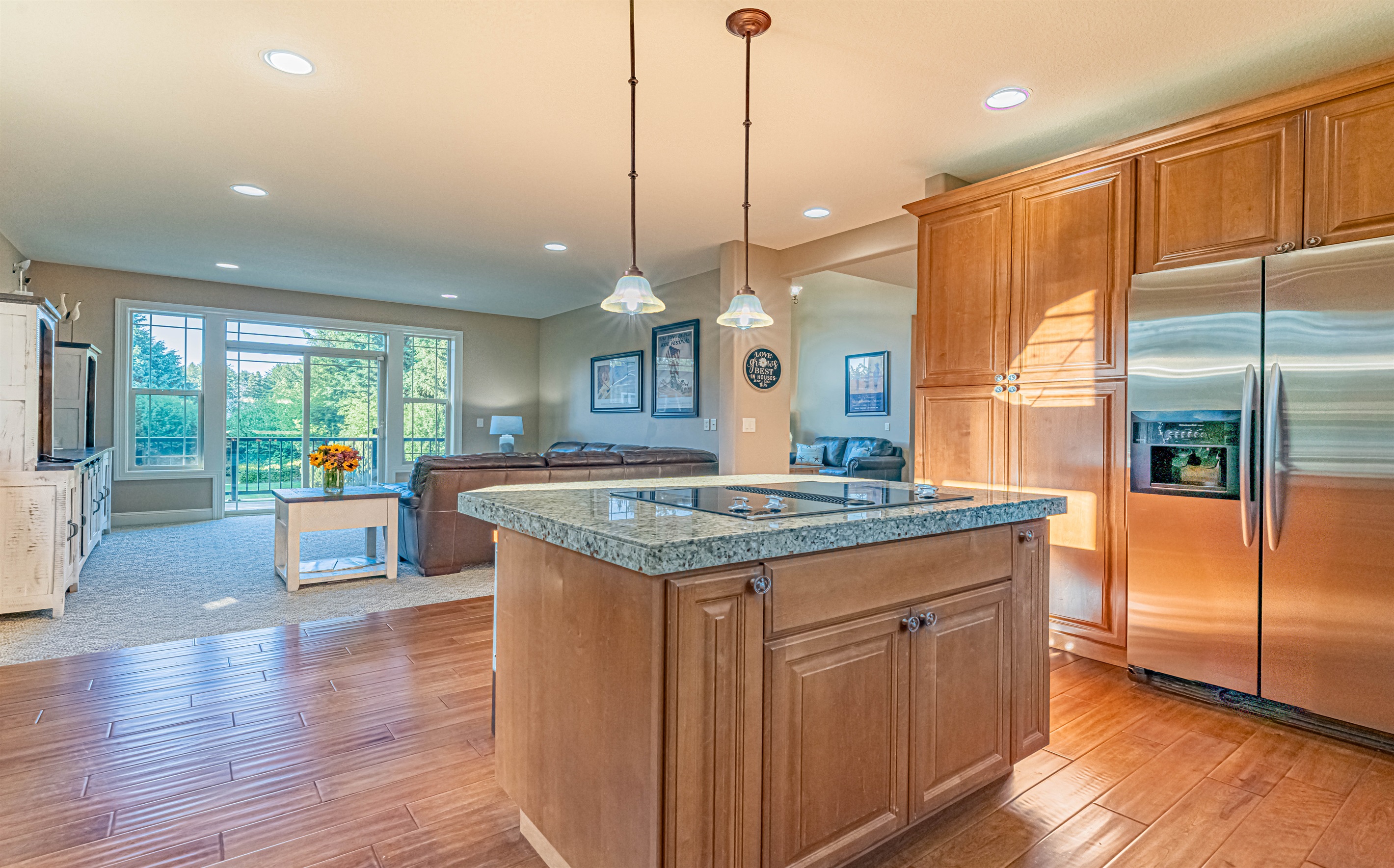 Kitchen island with ceramic cook top.