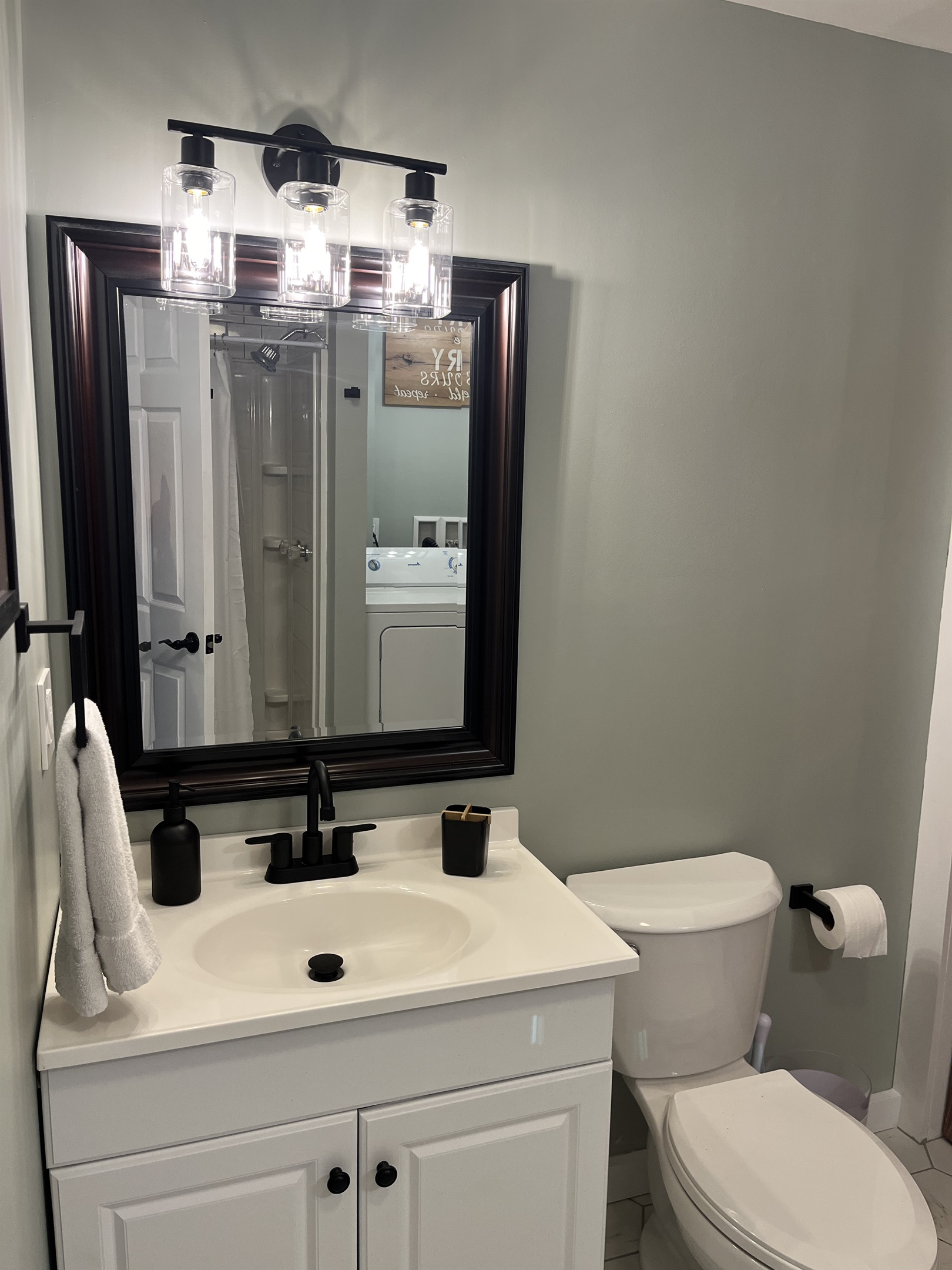 2nd bathroom with shower and laundry