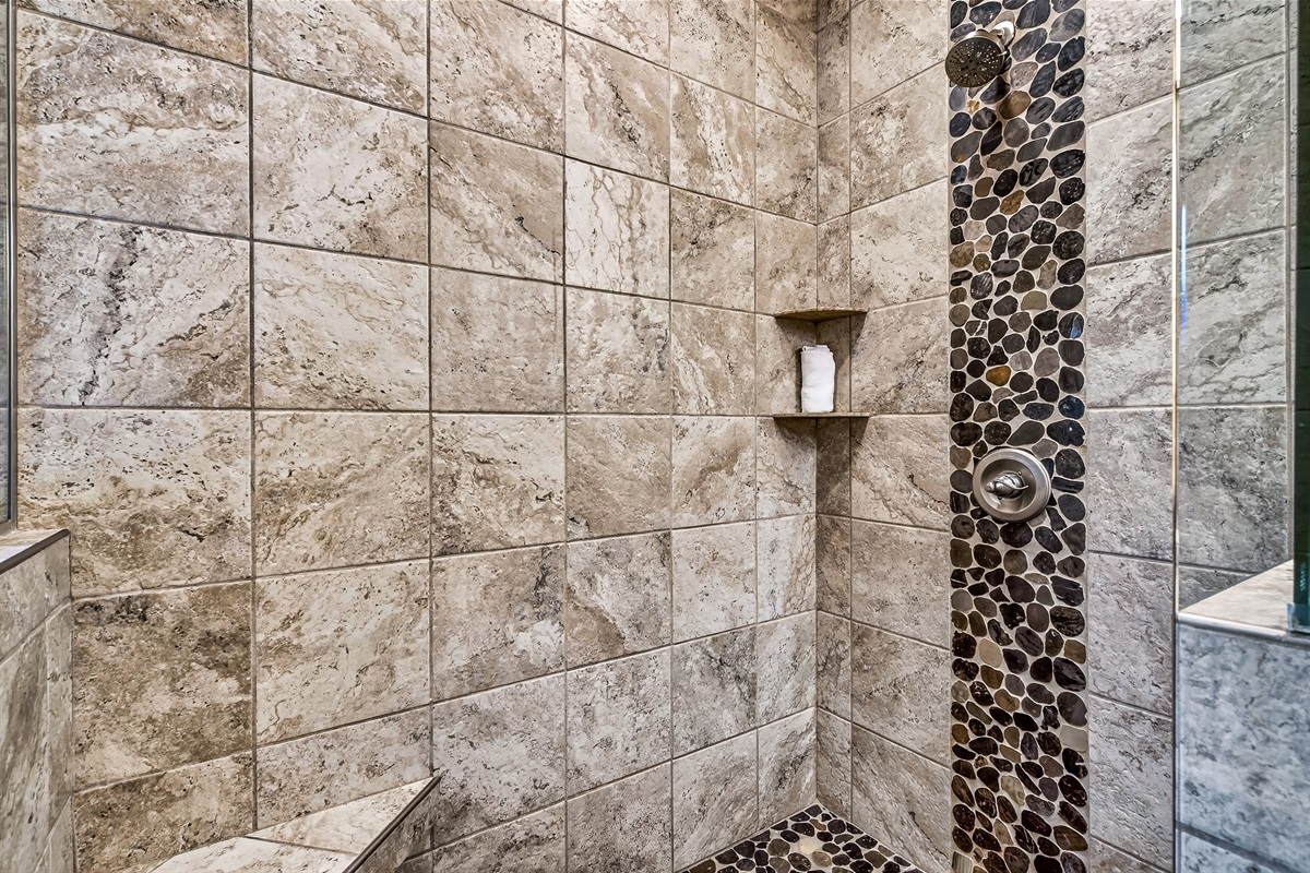 Walk in tiled shower in the master ensuite bathroom
