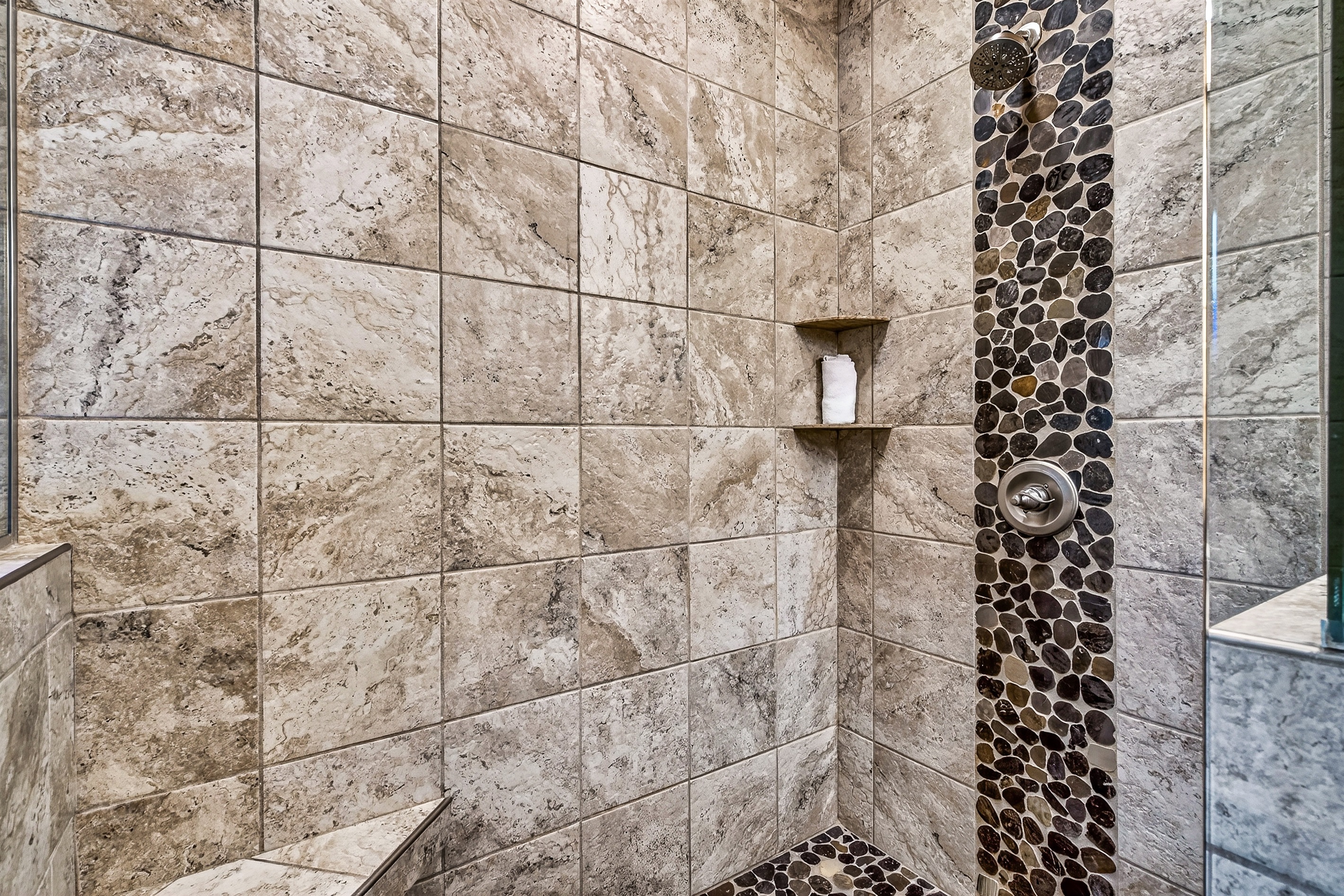 Walk in tiled shower in the master ensuite bathroom