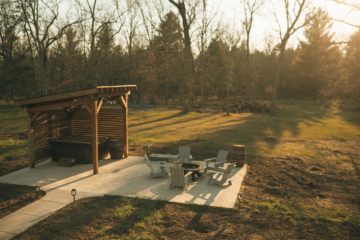 Patio with firepit and hot tub