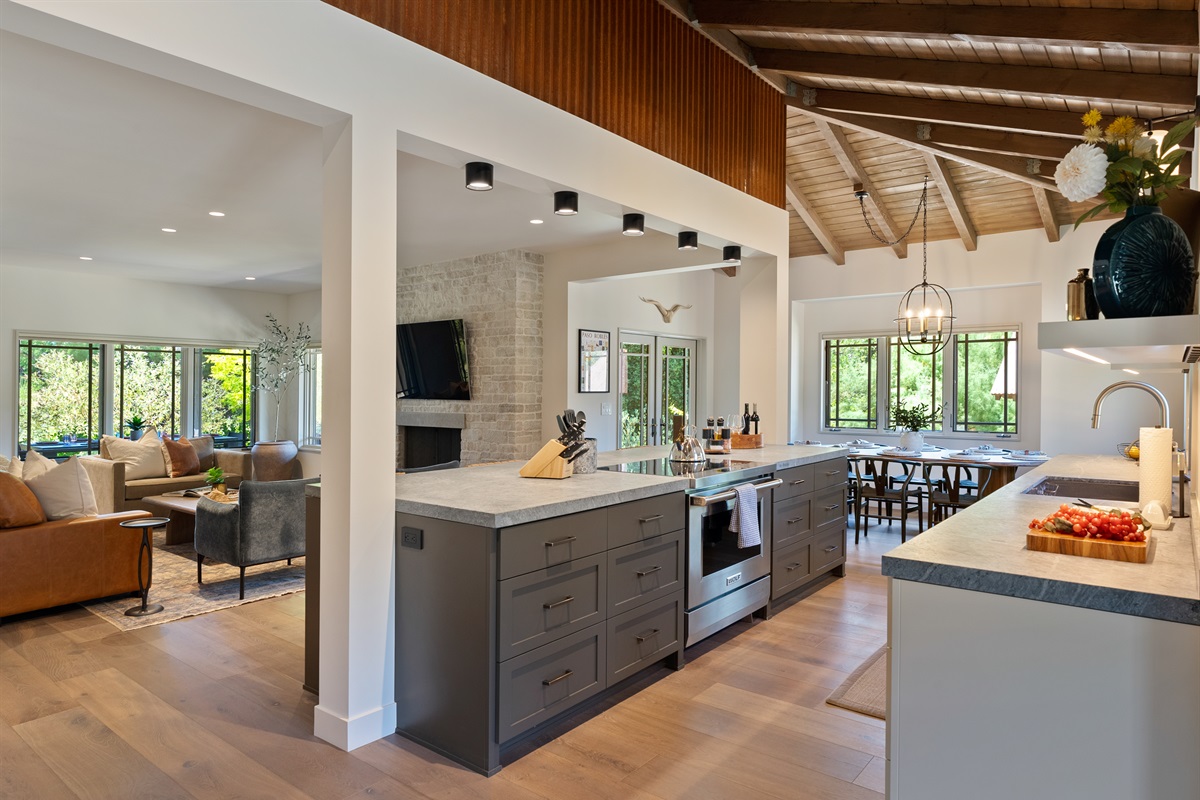Expansive eat-in island with induction cooktop and oven