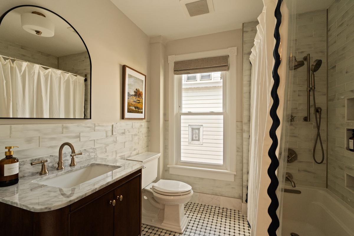 A beautifully updated full bathroom with flexibility. The tub/shower combination makes it easy for everyone, from quick morning showers to bath time for the little ones.