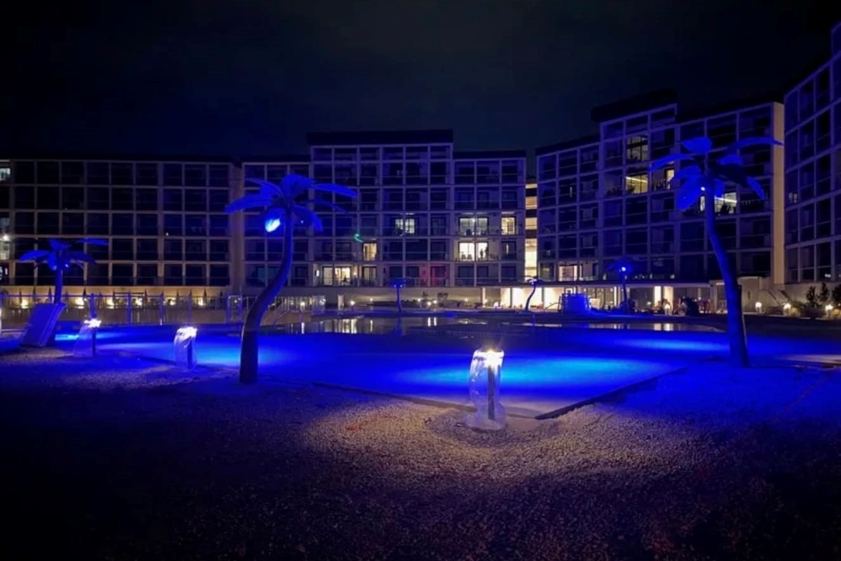 Pool has lights for night time swimming and gathering in common spaces