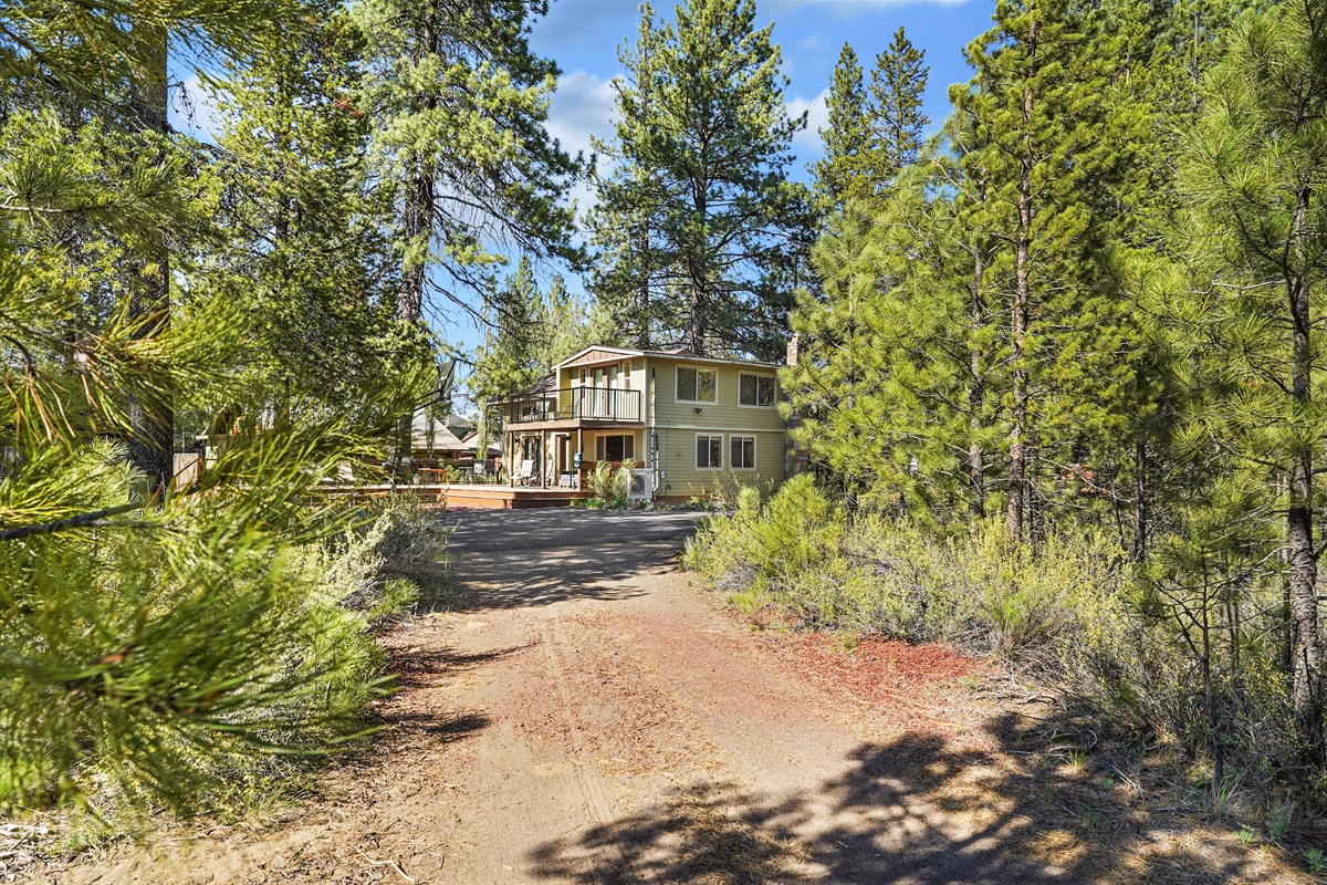 Private wooded setting with driveway parking