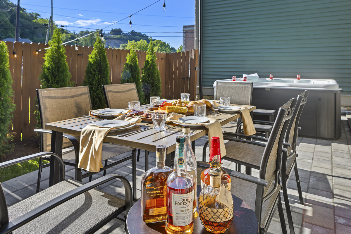 With Woodford Reserve poured, the outdoor table set, and the hot tub steaming nearby, your afternoon plans are already taken care of.