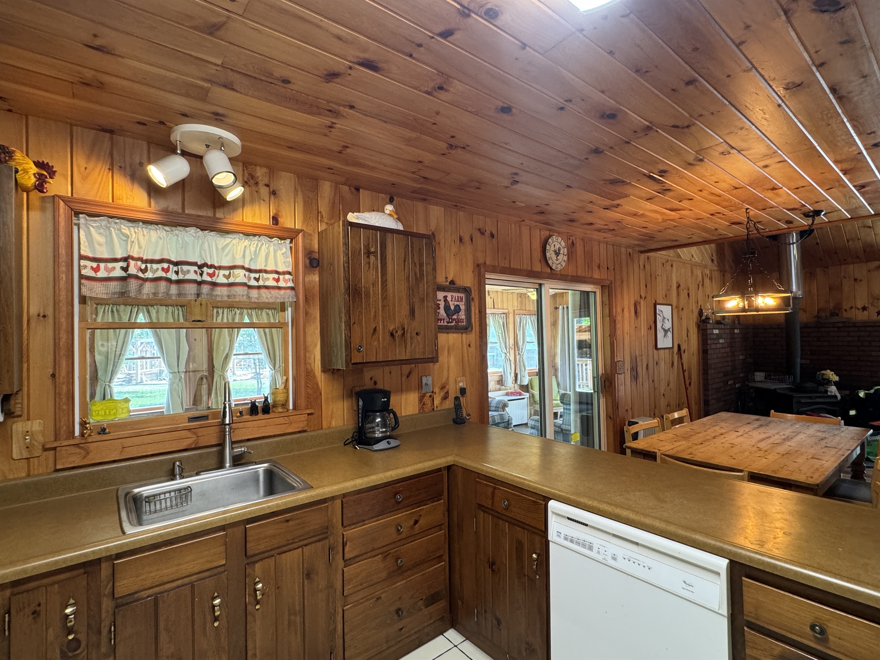 Kitchen looking into Sunroom
