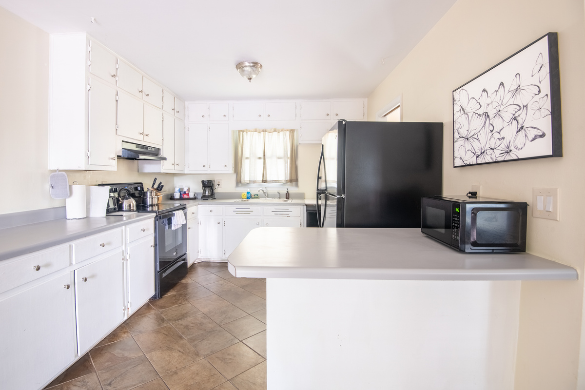 With generous counter space and a full set of appliances, there's plenty of room to cook, serve, and gather before your next adventure.