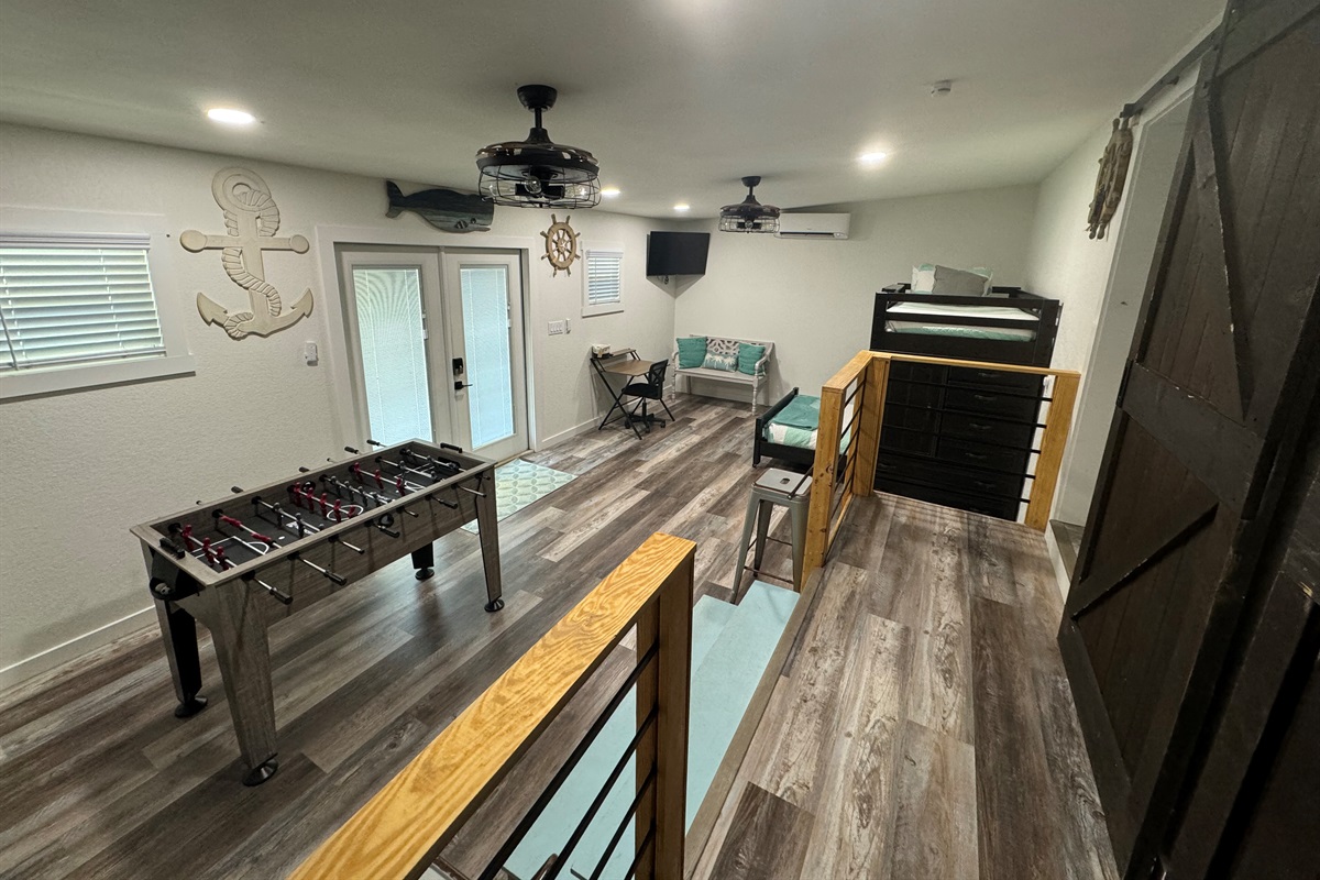 Third bedroom with bunk beds and foosball table,  additional 2 twin rollaways are available for set up in this room