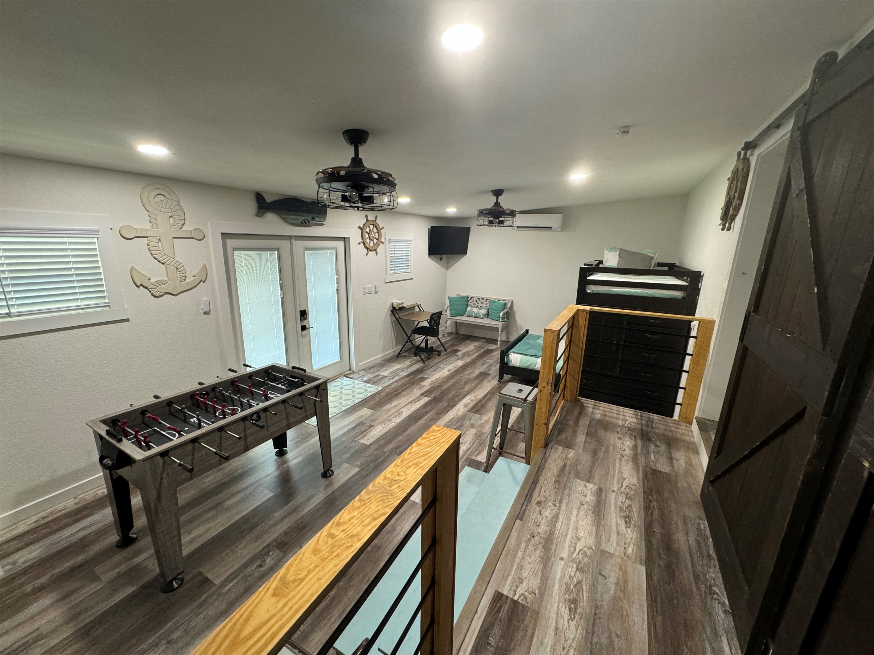 Third bedroom with bunk beds and foosball table,  additional 2 twin rollaways are available for set up in this room