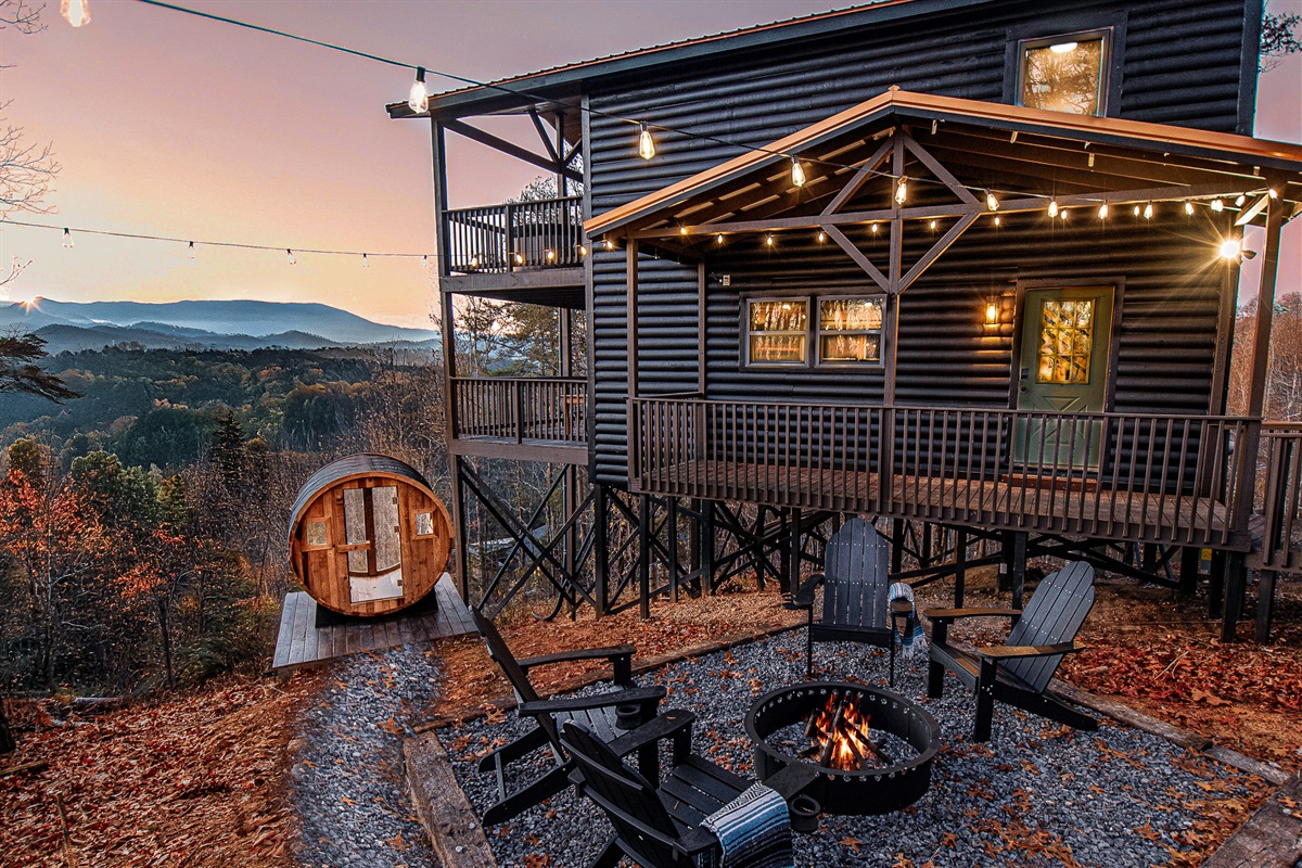 Fireside chats are more fun by our real, wood-burning outdoor firepit! Recharge in the glass wall barrel sauna and enjoy the most beautiful views in all of the Smokies!