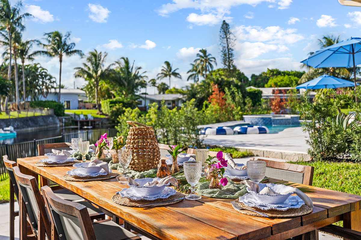 Thoughtfully styled outdoor dining makes every meal feel like a special occasion.