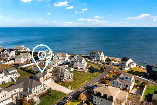 See your seaside retreat from above, just steps from the shoreline and minutes from the 'Spit'.