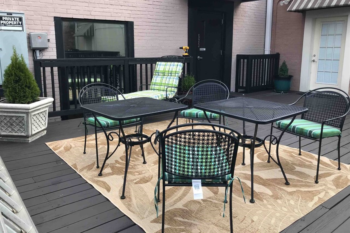 The outdoor deck area is perfect for relaxation, especially after dinner. It's also a great spot to soak in the lively atmosphere of downtown music on a summer evening.