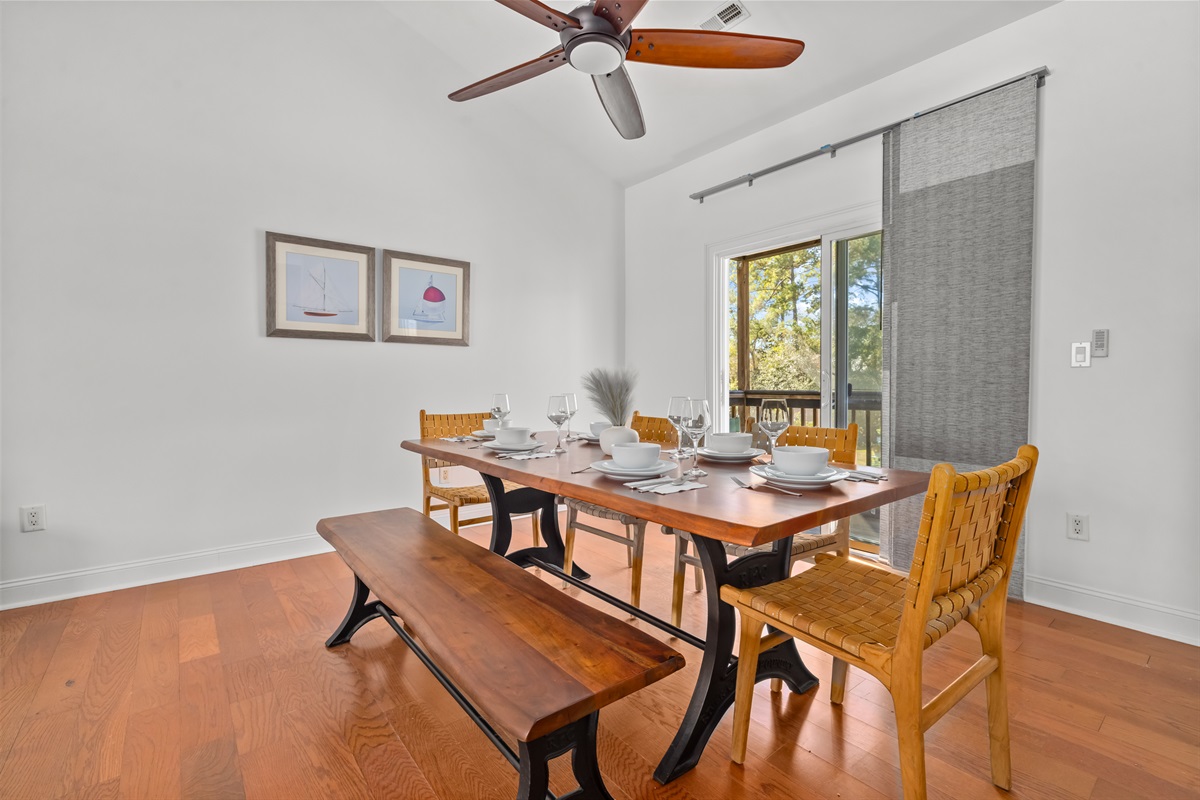 This spacious family dining area invites slow breakfasts, shared dinners, and late-night conversations. Natural light, warm wood tones, and seating for the whole crew make every meal feel like part of the vacation.