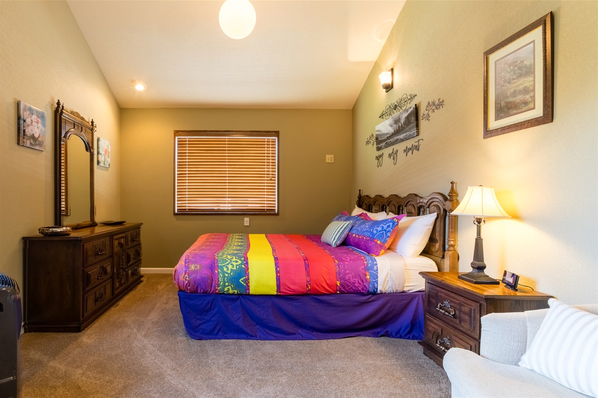 Guest bedroom with a king bed.