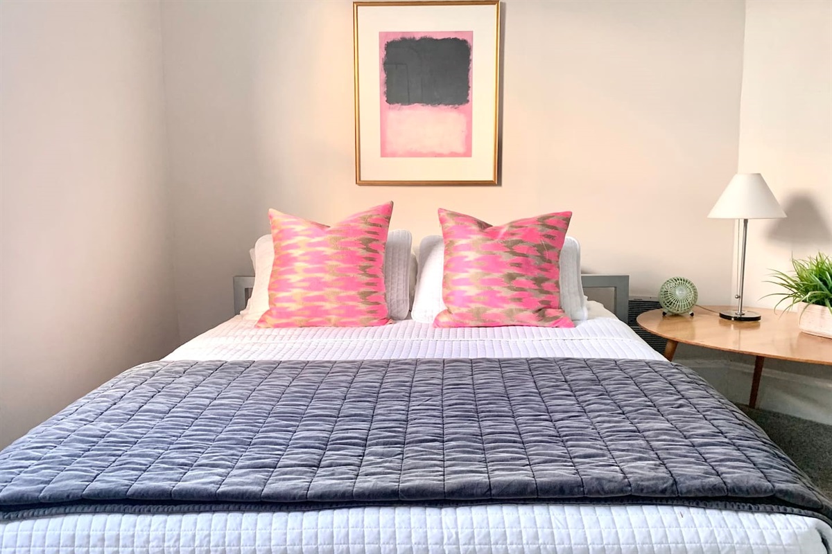 Queen Bedroom - featuring the same high-quality bedding, blackout shades and curated aesthetic for consistent comfort throughout the home.