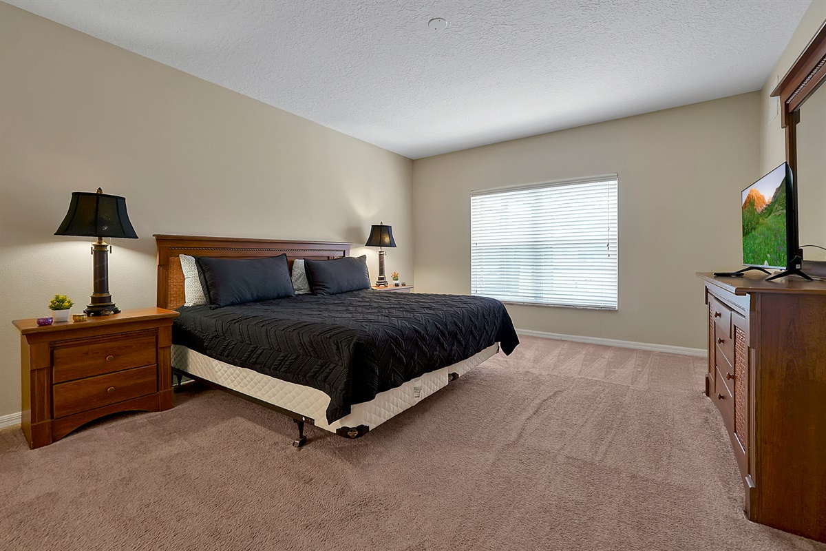 Retreat to the spacious ground-floor master, featuring a private ensuite for ultimate comfort and convenience