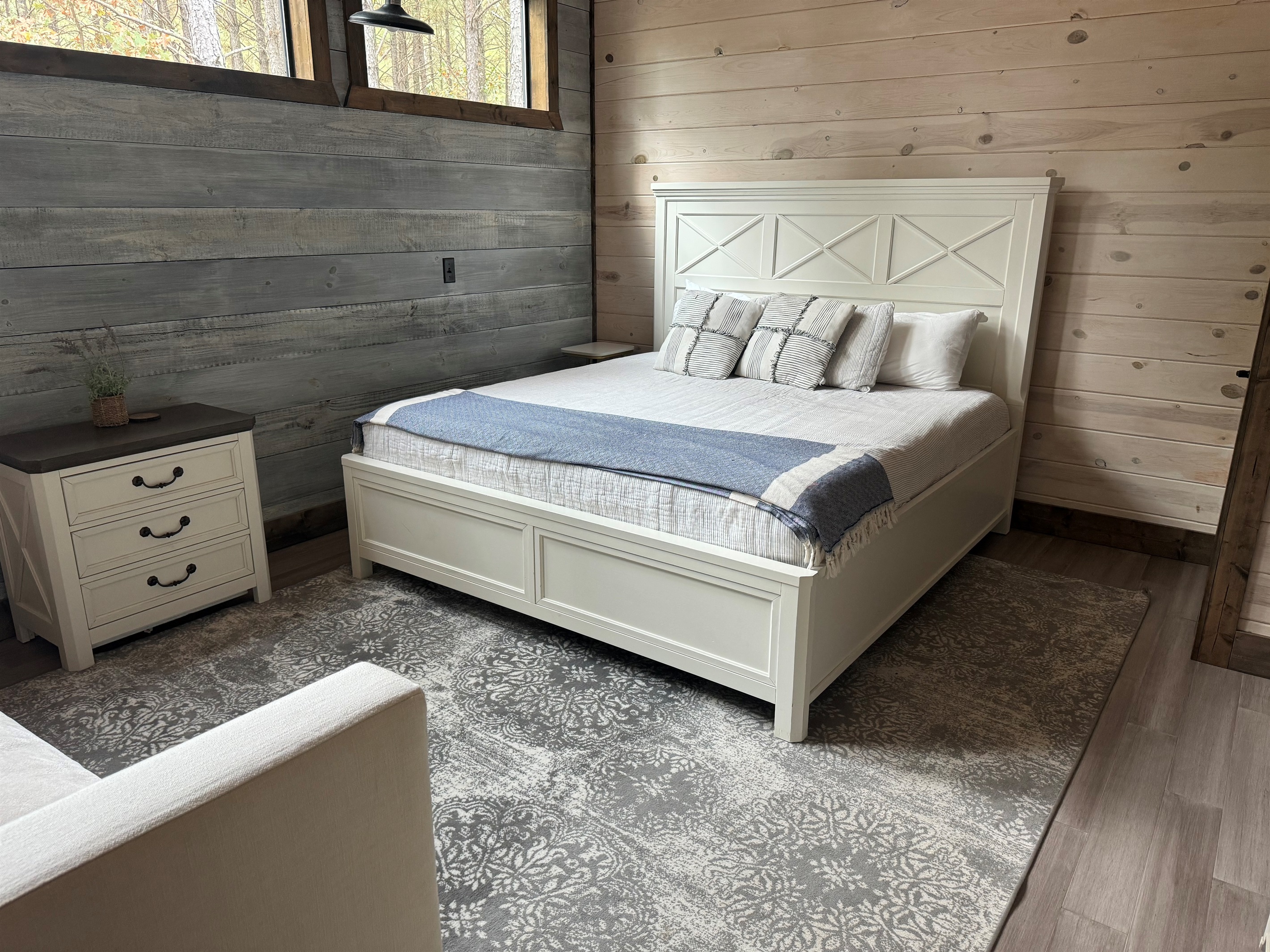 Spacious and versatile, this bedroom features both a plush king bed and a cozy single bed — perfect for families, friends, or groups wanting to stay together without sacrificing comfort