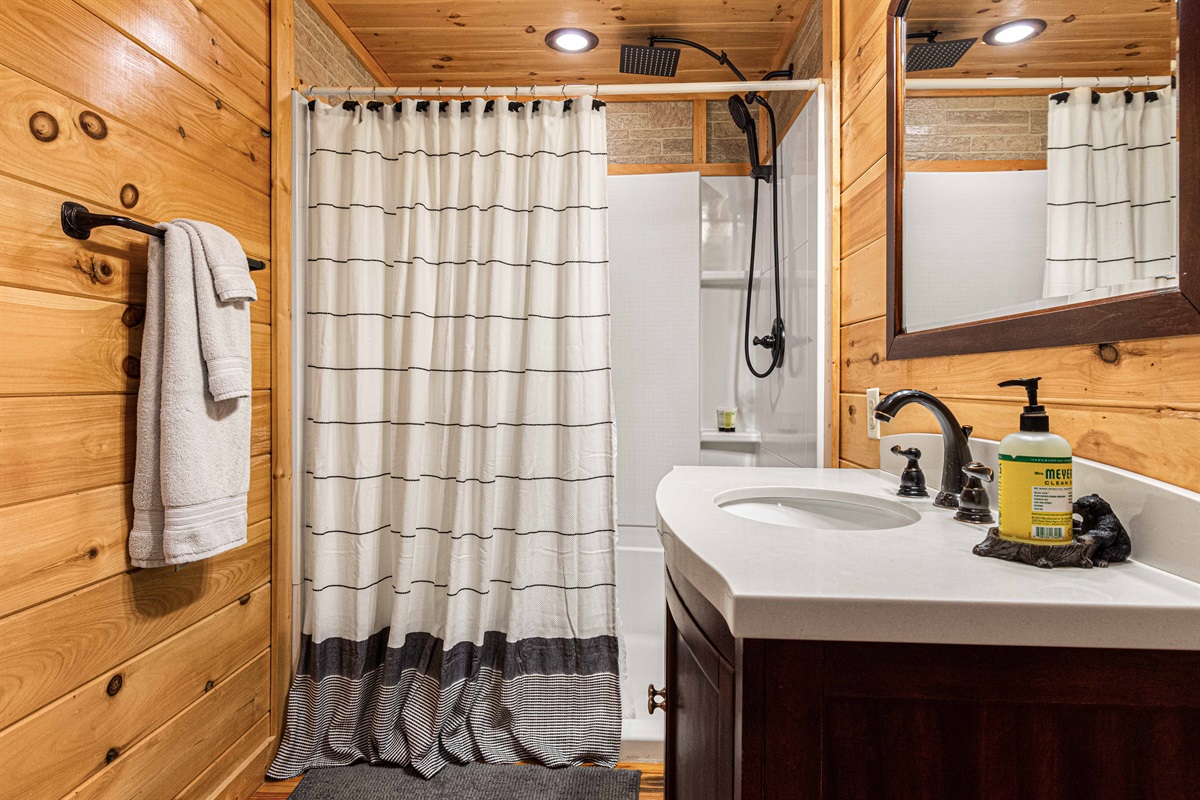 Enjoy a private retreat in this charming bathroom.