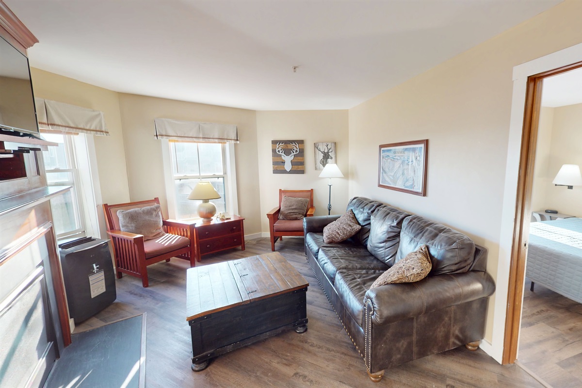 Warm lodge vibes, comfy seating, and room for the whole crew.