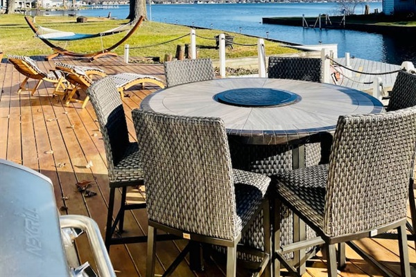Outdoor dining area overlooking Paw Paw Lake.