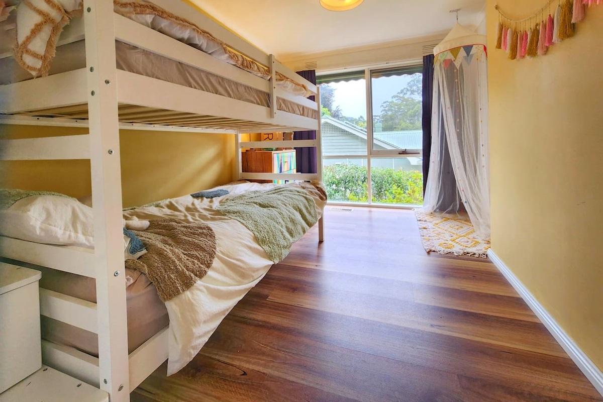 A refresh of photos are needed here! All for the better. Adults are welcome, but the double-bunk room has been setup primarily with kids in mind. There are books, fluffy toys, lego and plenty to ensure the littlies are happy and entertained.